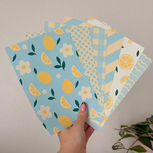 Printed A5 paper pack with yellow illustrated designs on matte paper