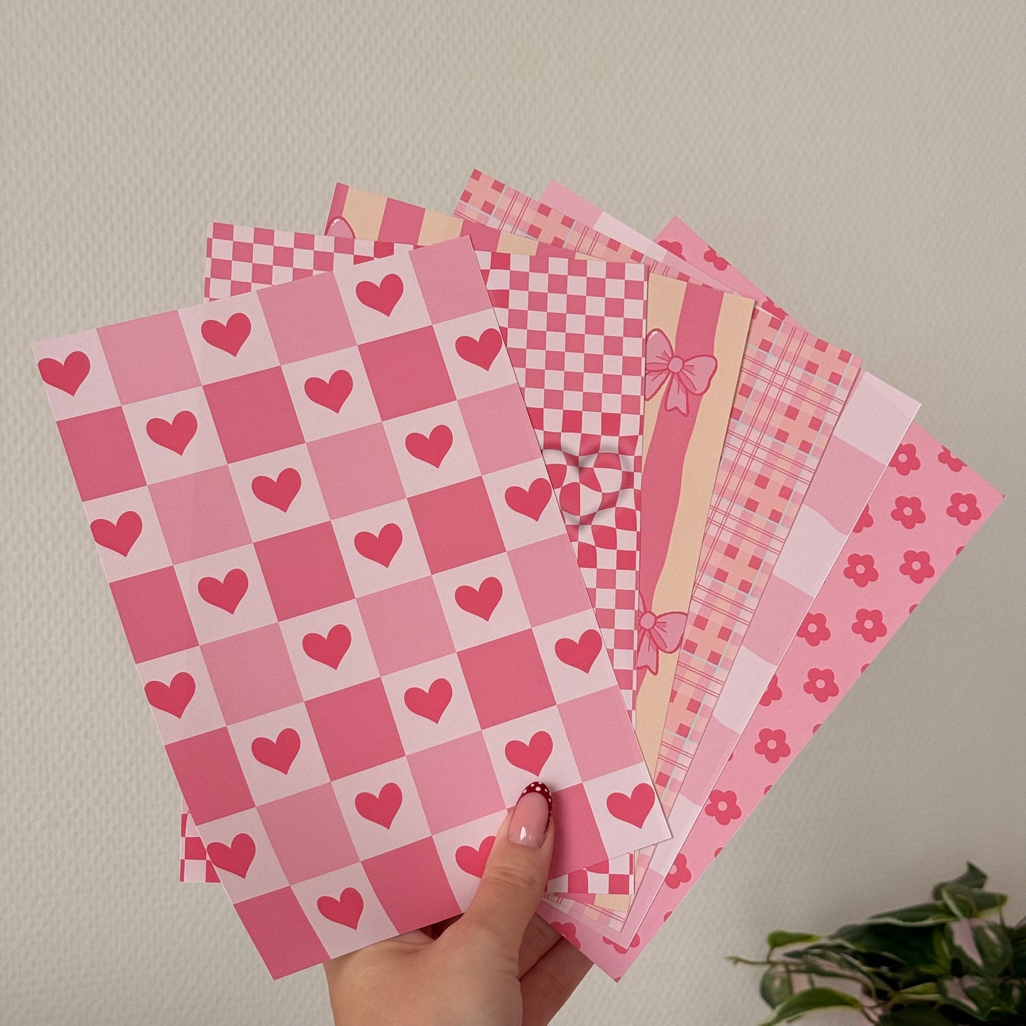 Printed A5 paper pack on matte paper with pink illustrated designs for journaling and scrapbooking