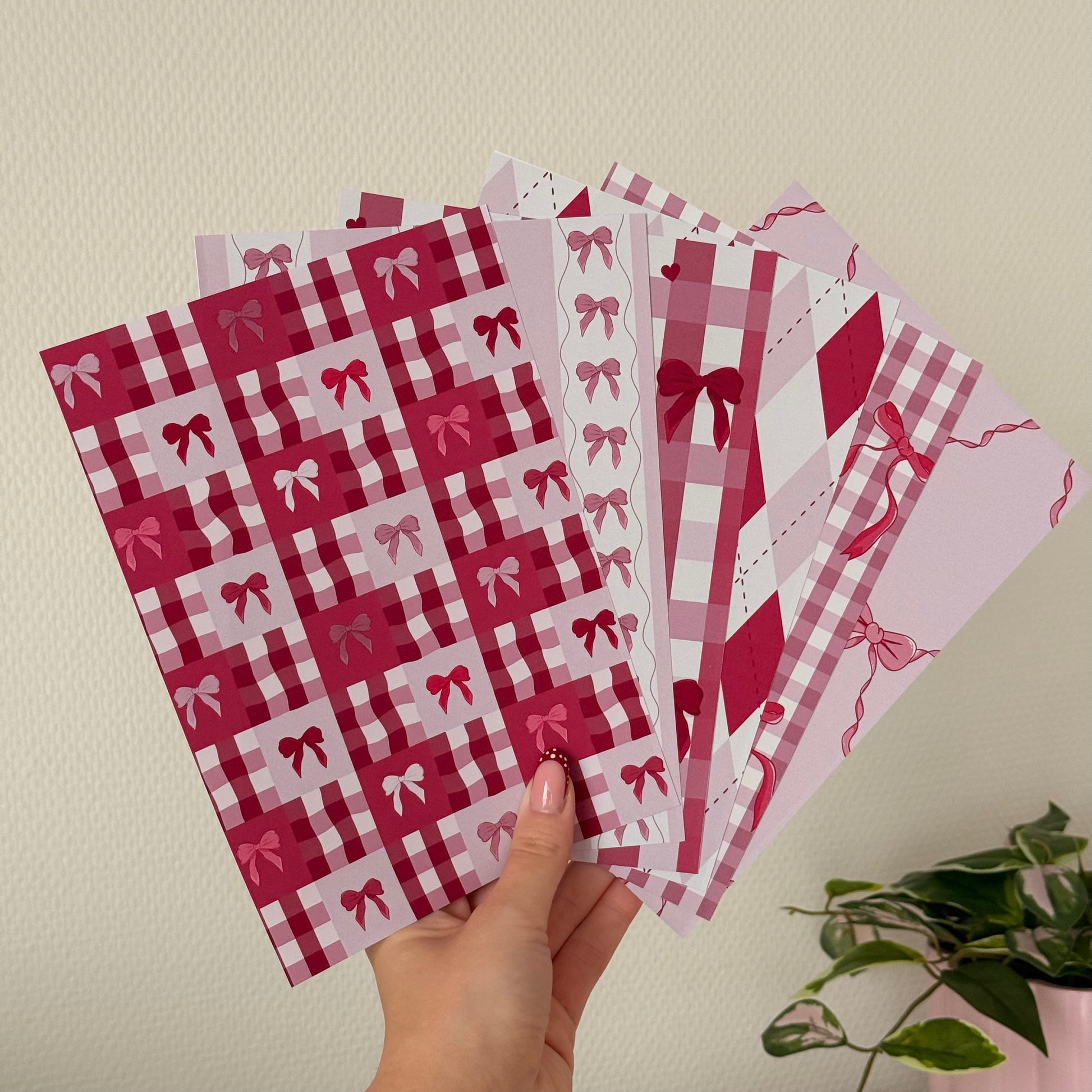 Printed A5 paper pack on matte paper with bow illustrations in soft pink tones