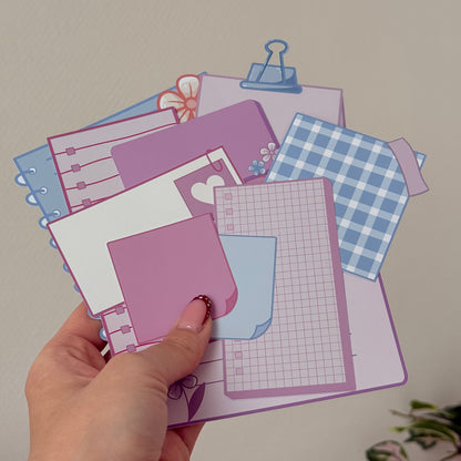 Printed paper cut-outs with school-themed designs on matte paper
