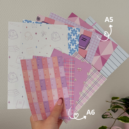 Printed A5 and A6 journal papers with school-inspired designs on matte paper