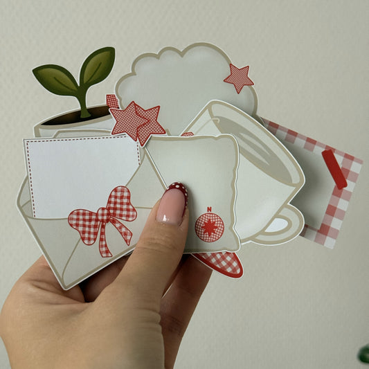 Close-up of journal prompt paper cut-outs on matte paper