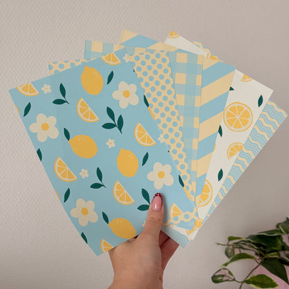 Printed A5 paper pack with yellow illustrated designs on matte paper