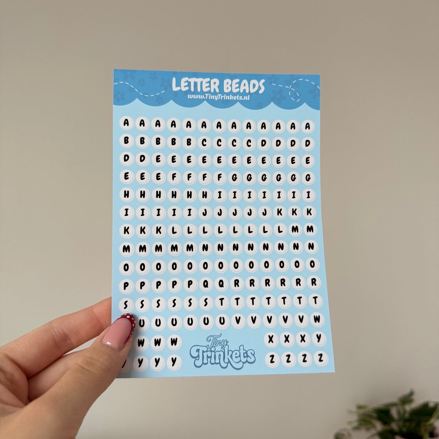 Printed sticker sheet with letter bead style alphabet stickers on glossy paper