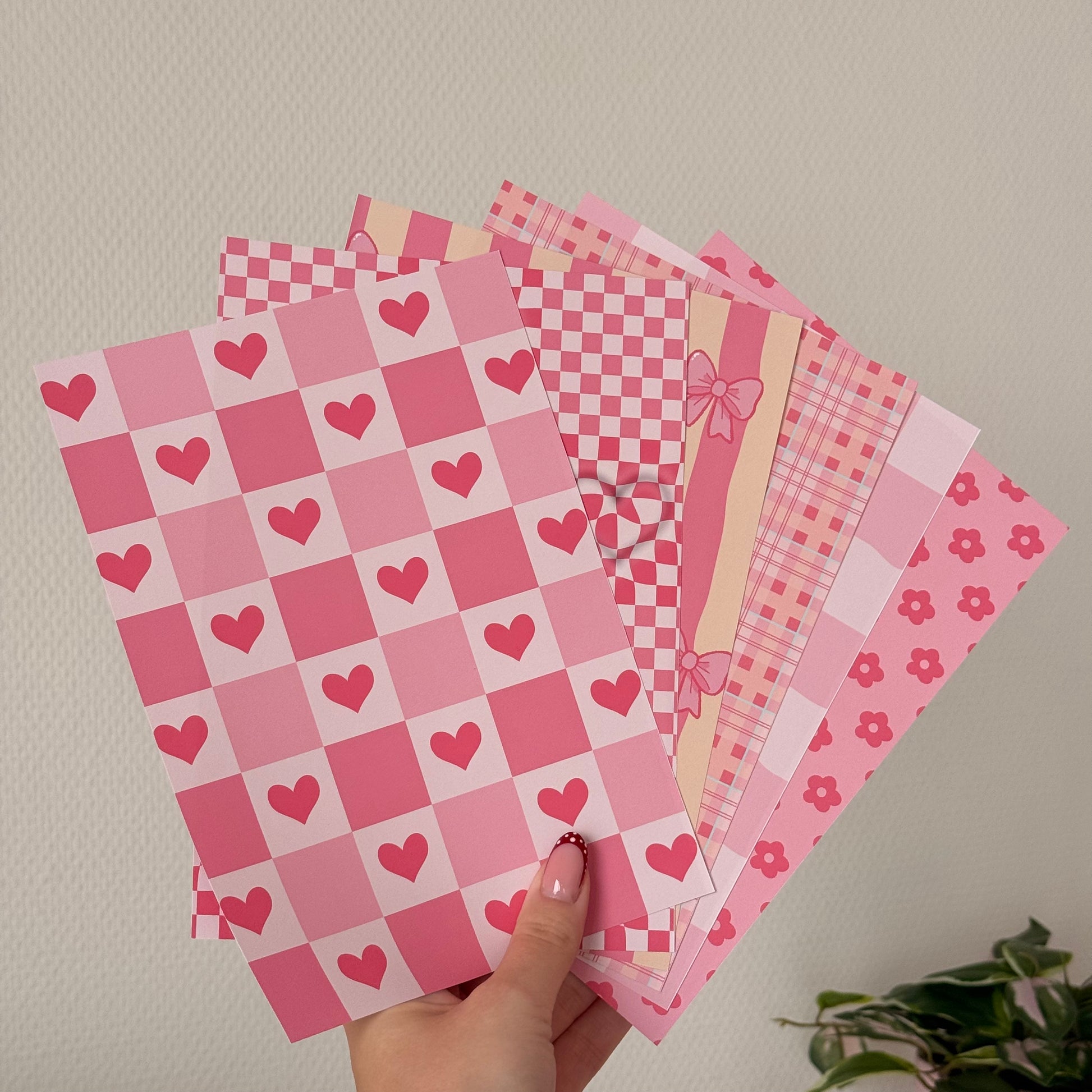 Printed A5 paper pack on matte paper with pink illustrated designs for journaling and scrapbooking