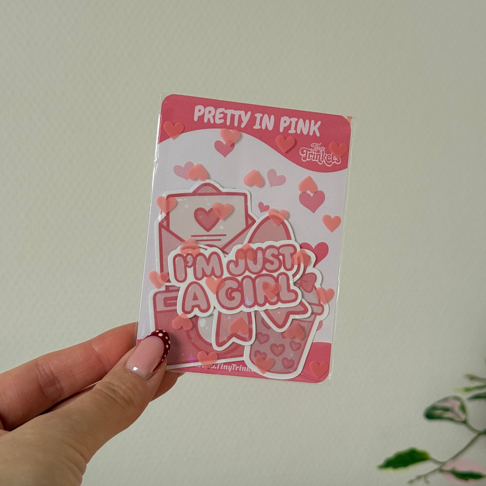 Printed die-cut sticker pack with pink designs and holographic star finish